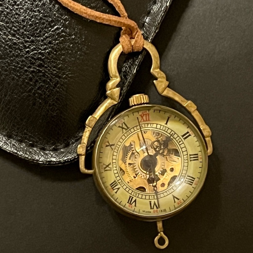 Steampunk magnifying orb watch, transparent, handwinding, very unique looking